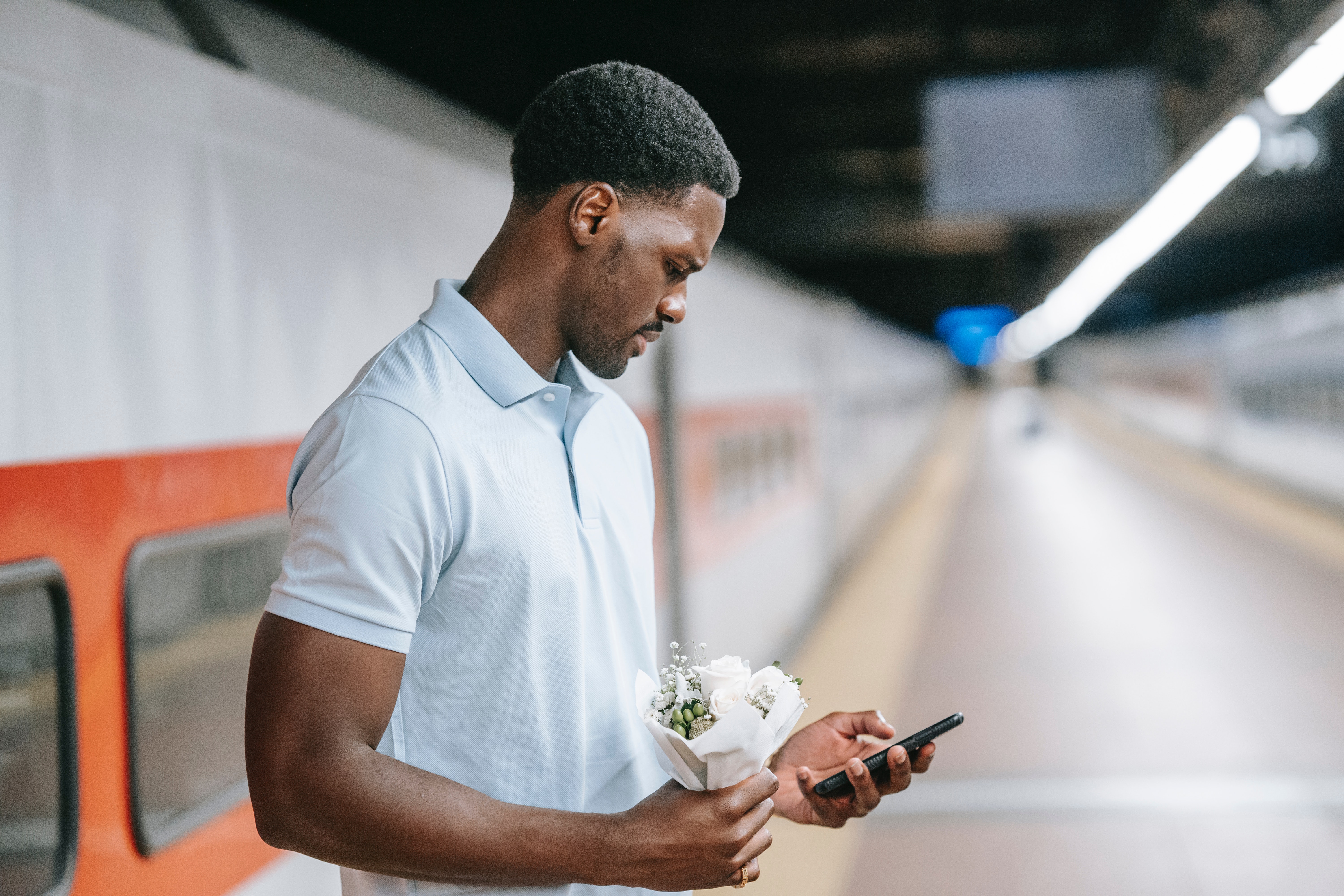 man looking at phone